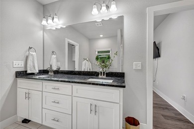 Tucked into the wooded hills of Bella Vista, this home delivers - photo 15