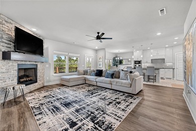 Tucked into the wooded hills of Bella Vista, this home delivers - photo 18