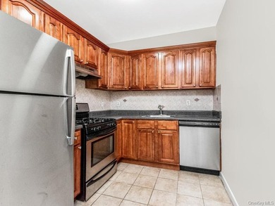 Welcome home to this charming 1-bedroom top-floor walk-up - photo 2