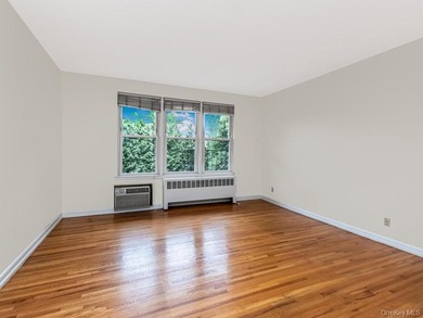 Welcome home to this charming 1-bedroom top-floor walk-up - photo 3