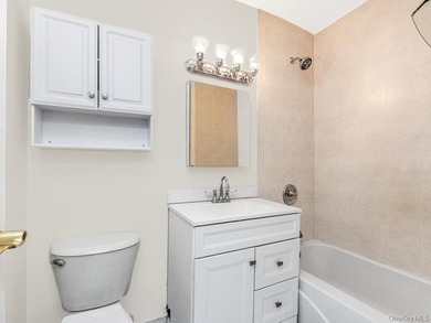 Welcome home to this charming 1-bedroom top-floor walk-up - photo 5