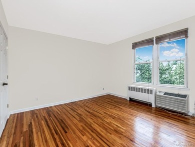 Welcome home to this charming 1-bedroom top-floor walk-up - photo 7