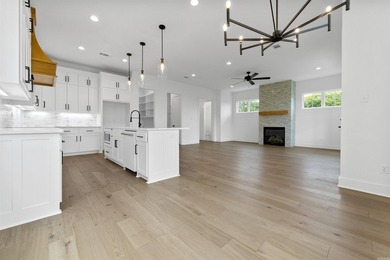 This gorgeous 3 story custom build is almost ready to be called - photo 8