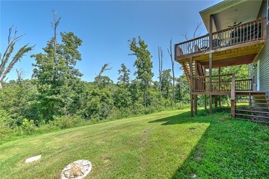 Tucked into the wooded hills of Bella Vista, this home delivers - photo 36