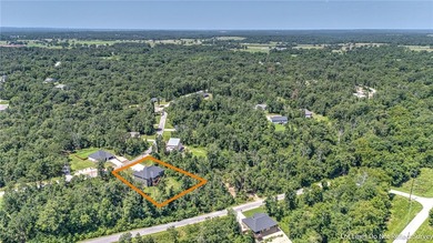 Tucked into the wooded hills of Bella Vista, this home delivers - photo 41