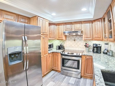 Discover your new beginning at Anastasia Condominiums, a gated - photo 2