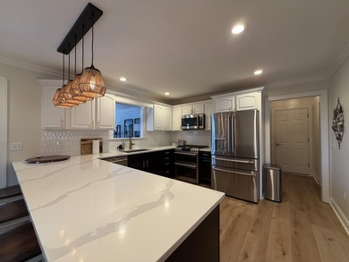 Experience luxury lakefront living at its finest on beautiful - photo 26