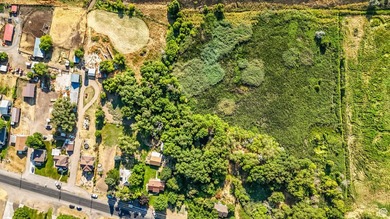 This rare 6.63-acre property within city limits features a - photo 29