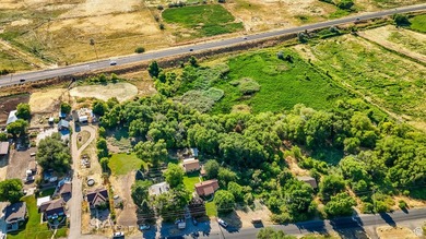 This rare 6.63-acre property within city limits features a - photo 30