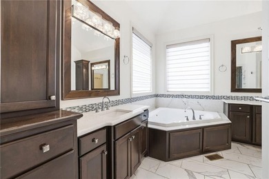 Welcome home to this beautifully designed reverse 1.5-story - photo 33