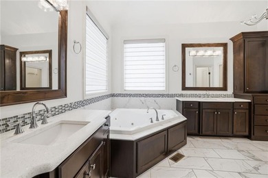 Welcome home to this beautifully designed reverse 1.5-story - photo 34