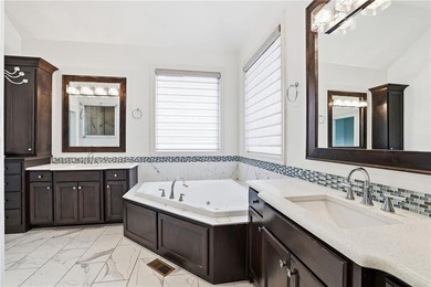 Welcome home to this beautifully designed reverse 1.5-story - photo 35