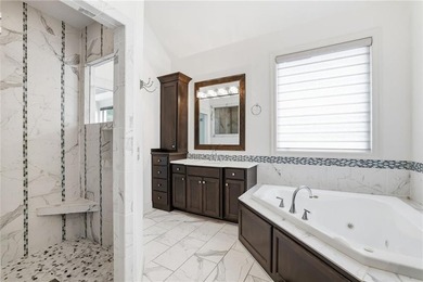 Welcome home to this beautifully designed reverse 1.5-story - photo 36