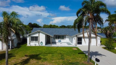 Lake Home For Sale in Holiday, Florida