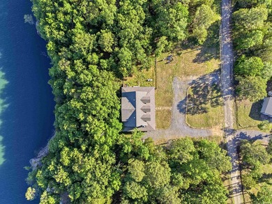 Experience luxury lake living with seasonal lake views in this - photo 2