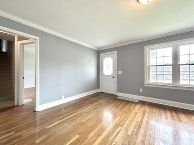 Welcome home to this spacious 5-bedroom, 2-bath property located - photo 11