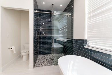 Beautifully renovated and move-in ready, this 5-bedroom, 4-bath - photo 11