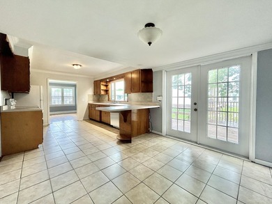 Welcome home to this spacious 5-bedroom, 2-bath property located - photo 17