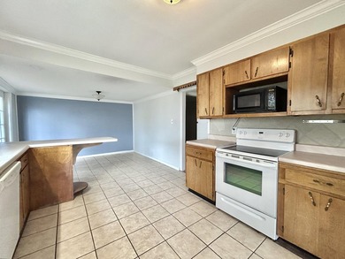 Welcome home to this spacious 5-bedroom, 2-bath property located - photo 19