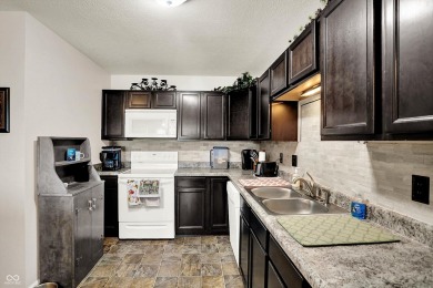 Welcome to this beautifully maintained 2-bedroom, 2-bath ranch