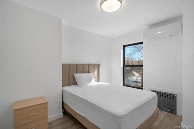 Turnkey, four-story two-family townhouse with cellar, offering - photo 11