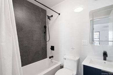 Turnkey, four-story two-family townhouse with cellar, offering - photo 12
