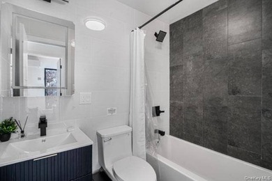 Turnkey, four-story two-family townhouse with cellar, offering - photo 13