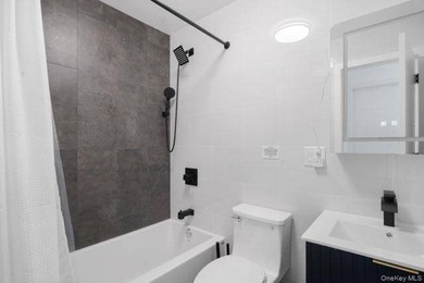 Turnkey, four-story two-family townhouse with cellar, offering - photo 14