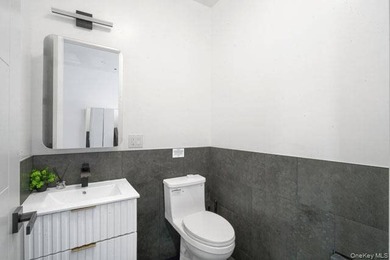 Turnkey, four-story two-family townhouse with cellar, offering - photo 15