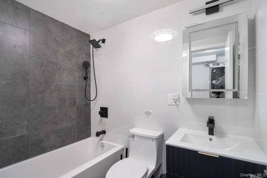 Turnkey, four-story two-family townhouse with cellar, offering - photo 16