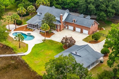 Set on 2.3 private acres overlooking the marsh, 5038 Stono - photo 5