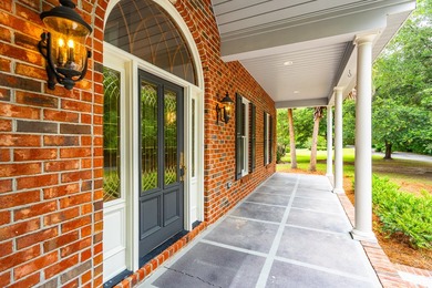 Set on 2.3 private acres overlooking the marsh, 5038 Stono - photo 7