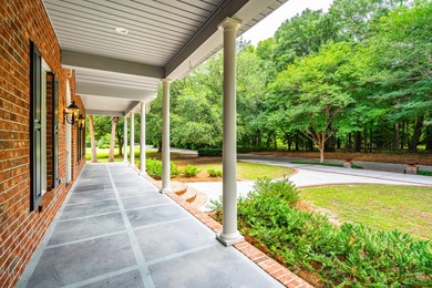 Set on 2.3 private acres overlooking the marsh, 5038 Stono - photo 8