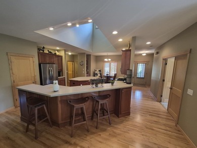 GORGEOUS COUNTRY FREE STANDING CONDO ON WOODED LOT W/WATER - photo 11