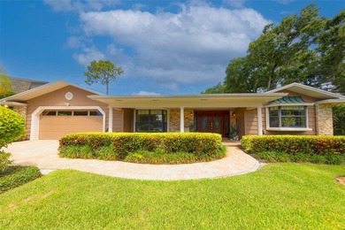 Welcome to this exceptional 4-bedroom, 4-bathroom pool home - photo 2