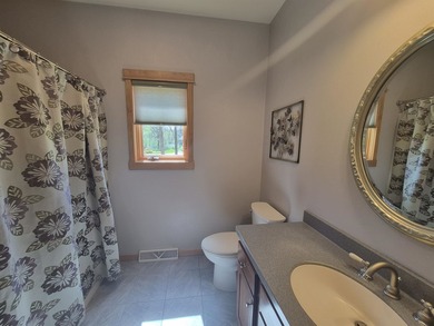 GORGEOUS COUNTRY FREE STANDING CONDO ON WOODED LOT W/WATER - photo 26