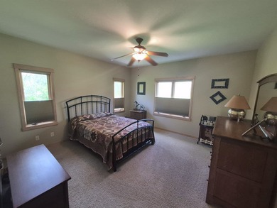 GORGEOUS COUNTRY FREE STANDING CONDO ON WOODED LOT W/WATER - photo 27