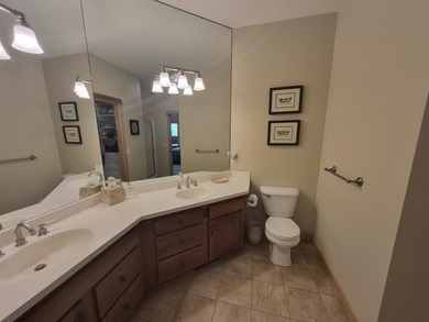 GORGEOUS COUNTRY FREE STANDING CONDO ON WOODED LOT W/WATER - photo 31