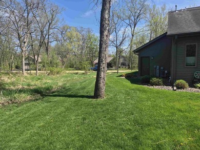 GORGEOUS COUNTRY FREE STANDING CONDO ON WOODED LOT W/WATER - photo 45