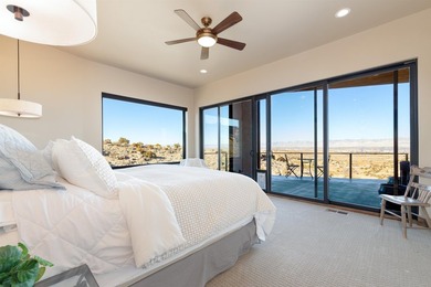 Set within the coveted Redlands Mesa community, this striking - photo 16