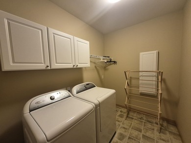 GORGEOUS COUNTRY FREE STANDING CONDO ON WOODED LOT W/WATER - photo 20