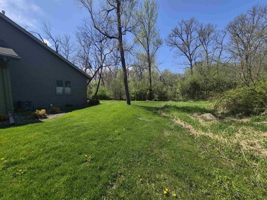 GORGEOUS COUNTRY FREE STANDING CONDO ON WOODED LOT W/WATER - photo 49