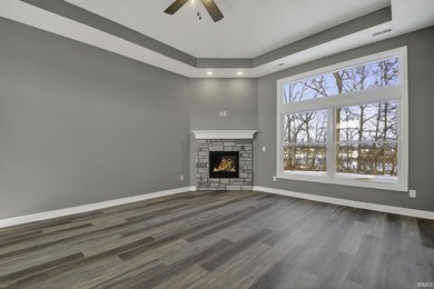 This new construction, ranch home, sits on a pond lot in the new - photo 4