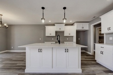 This new construction, ranch home, sits on a pond lot in the new - photo 5