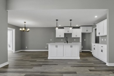 This new construction, ranch home, sits on a pond lot in the new - photo 6