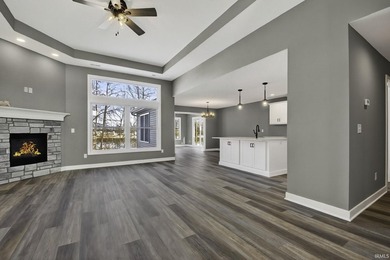 This new construction, ranch home, sits on a pond lot in the new - photo 9