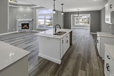 This new construction, ranch home, sits on a pond lot in the new - photo 10