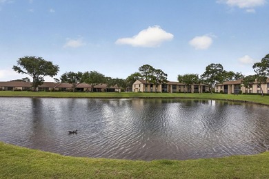 Enjoy peaceful lake views from this condo w/ living/dining room - photo 8