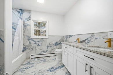 This recently renovated 3 bedroom 2 bathroom home features - photo 20