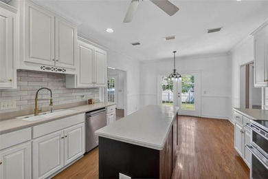 Welcome to Oak Grove Island, where this beautifully maintained - photo 12